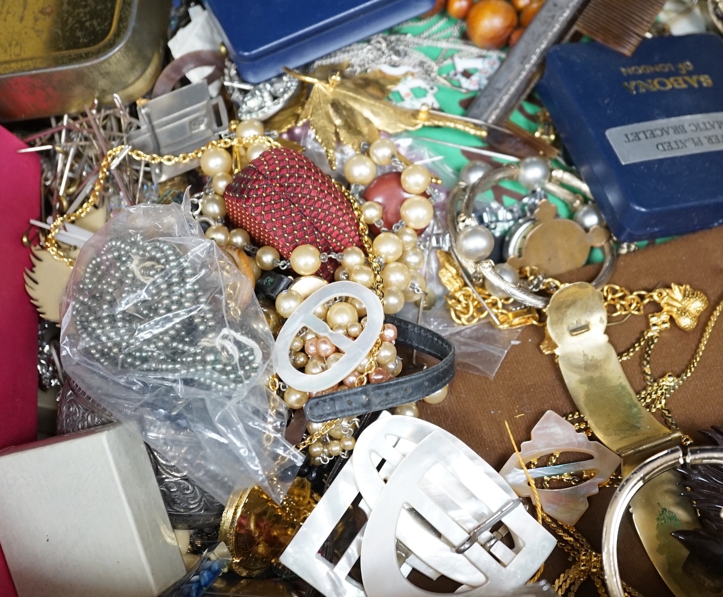 A large quantity of assorted mainly costume jewellery, including silver. Condition - fair